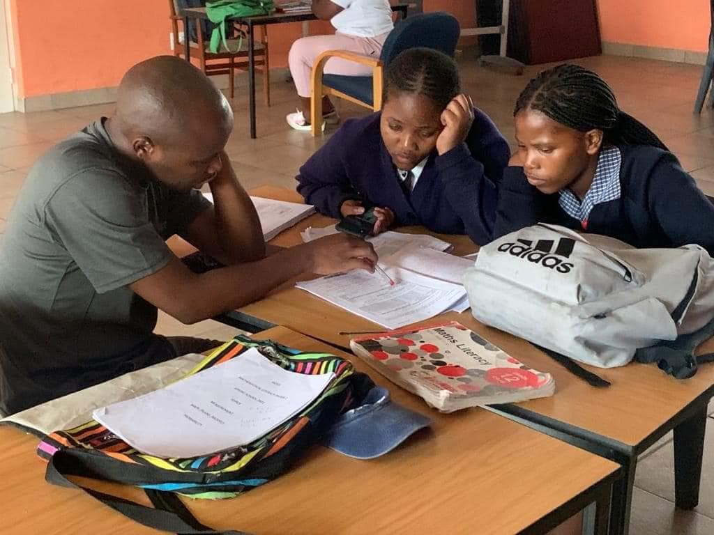 Tutor working with a student